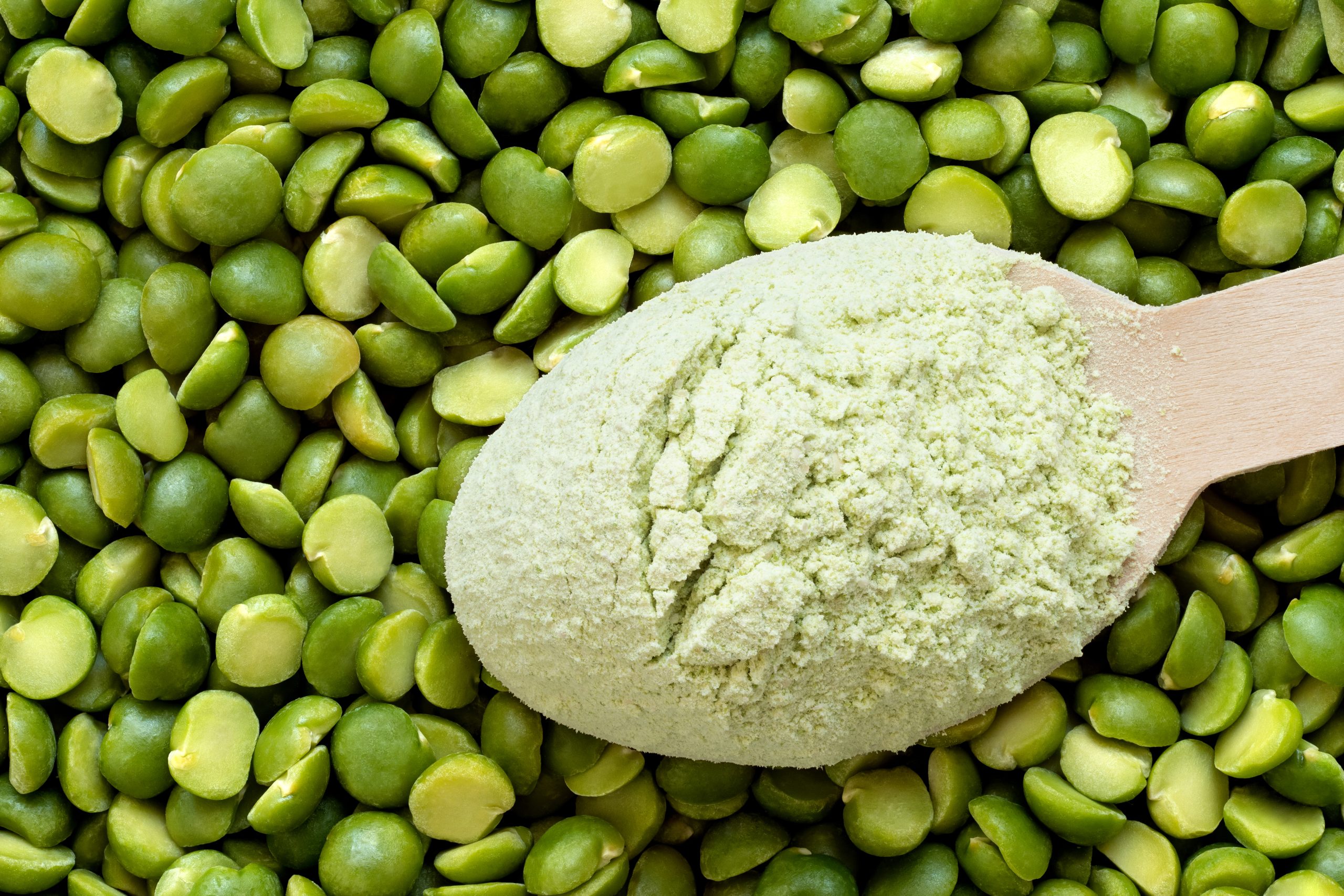 Wooden,Spoon,Of,Dried,Green,Pea,Flour,On,Top,Of
